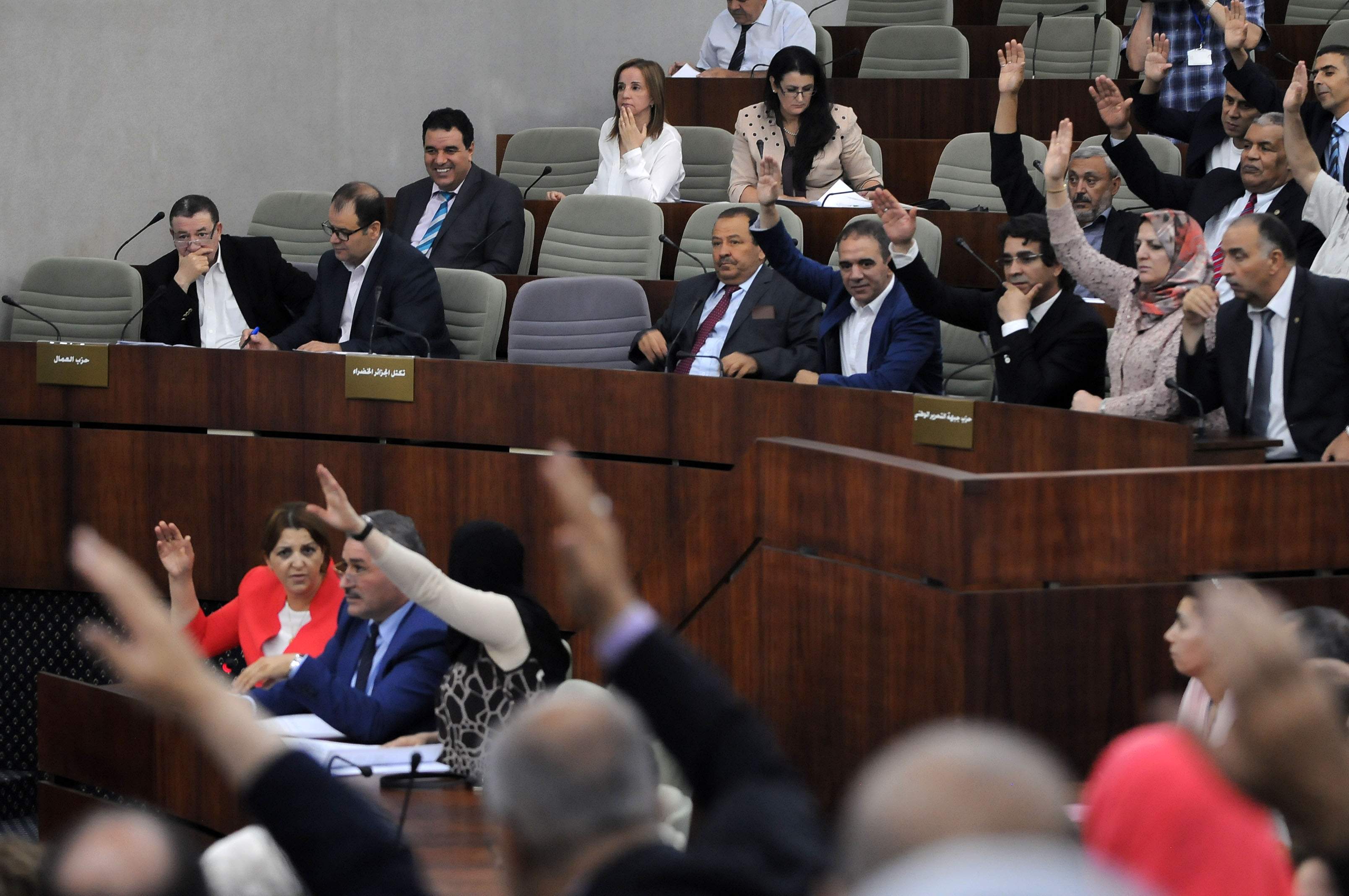 Les lois ont été votées par des députés dans un hémicycle à moitié vide. New Press